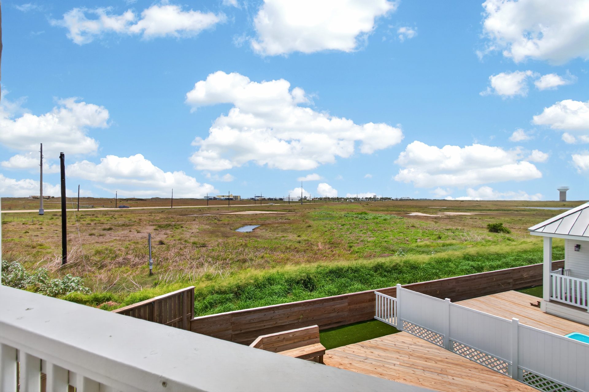 View from a Spoonbill home porch over the dunes toward the bay